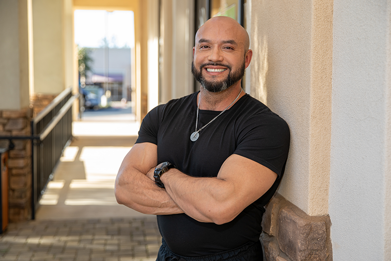 Redland Family Dental Care patient Jonathan smiling outside