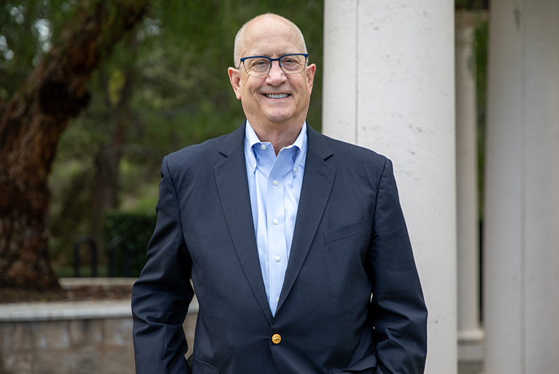 Redland Family Dental Care patient Philip smiling outside
